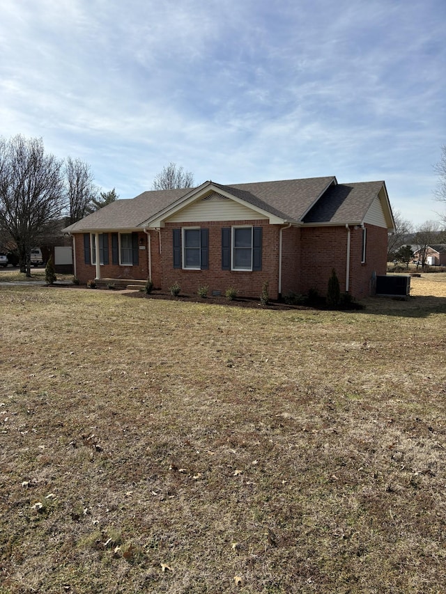 ranch-style home with a front yard