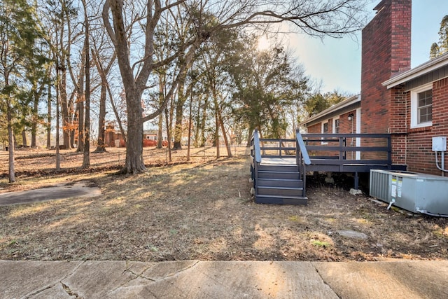 view of yard with a wooden deck