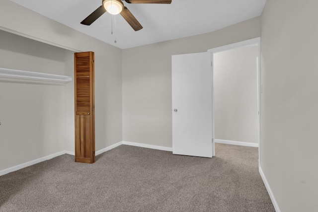 unfurnished bedroom featuring a closet, ceiling fan, and carpet flooring