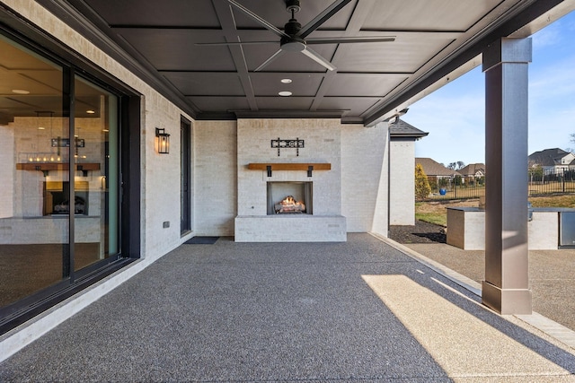 view of patio / terrace with a fireplace