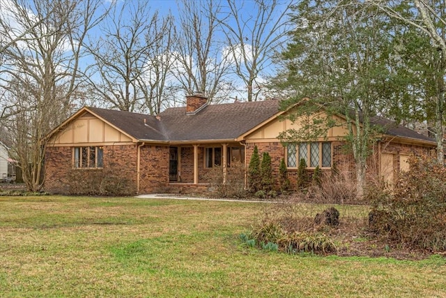 ranch-style home with a front lawn