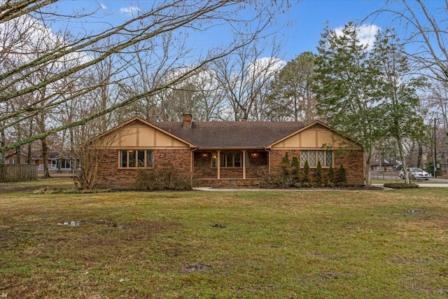 ranch-style house with a front yard