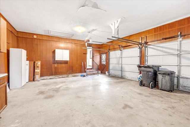 garage with wood walls