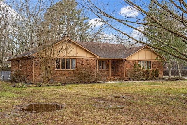 ranch-style home with a front yard