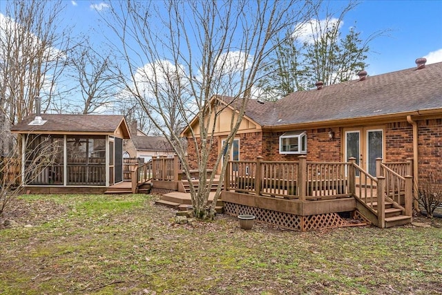 exterior space with a sunroom and a deck