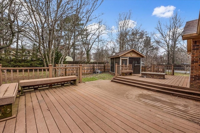 wooden terrace with a sunroom