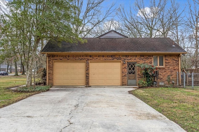 single story home with a garage and a front yard