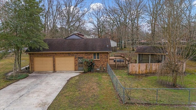 view of front of home with a garage, a deck, and a front lawn