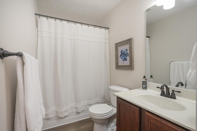 full bathroom with vanity, toilet, wood-type flooring, and shower / bath combo