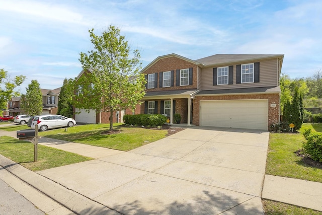 view of front facade featuring a garage and a front yard