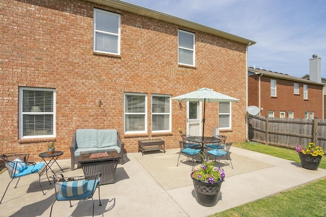 back of property featuring a patio area