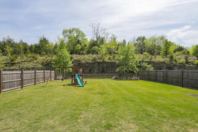 view of yard with a playground