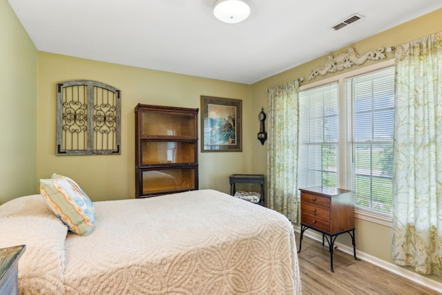 bedroom featuring light wood-type flooring