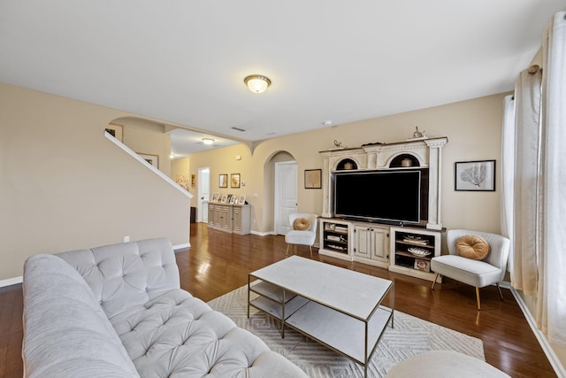 living room featuring dark hardwood / wood-style flooring