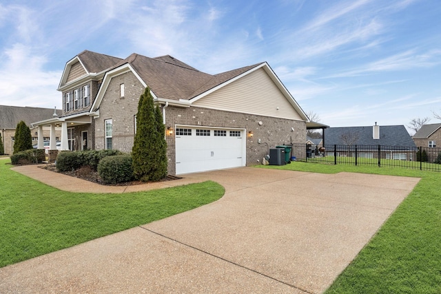 view of property exterior featuring a garage, a yard, and central AC unit