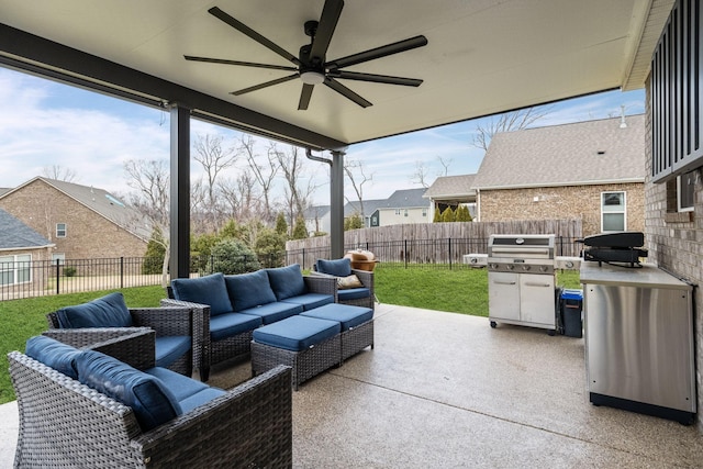 view of patio / terrace featuring an outdoor living space, area for grilling, and ceiling fan