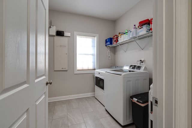 washroom featuring washer and clothes dryer