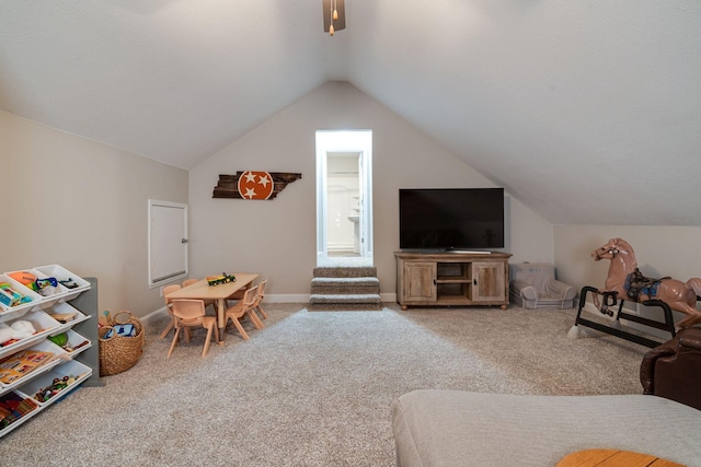 game room featuring vaulted ceiling and carpet