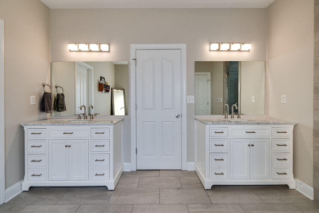 bathroom featuring vanity and tile patterned floors