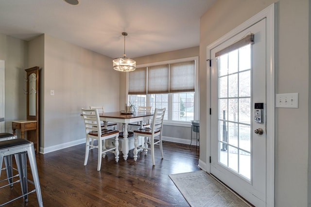 dining room featuring dark hardwood / wood-style flooring