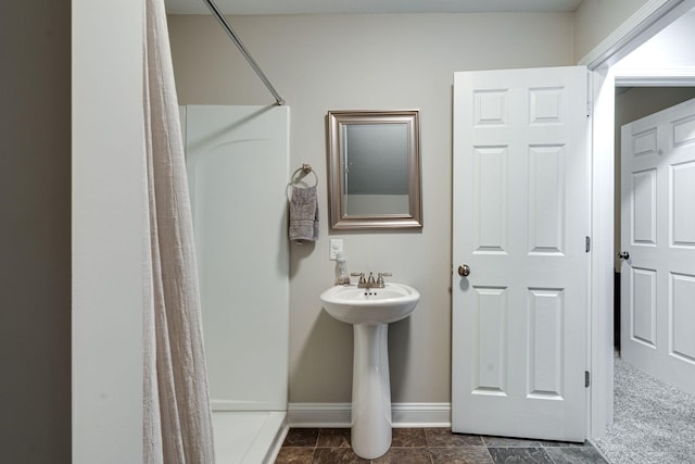 bathroom featuring a shower