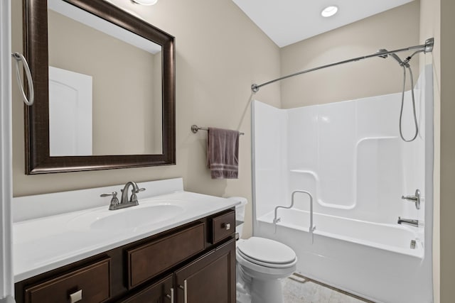 full bathroom with toilet, vanity, and bathtub / shower combination