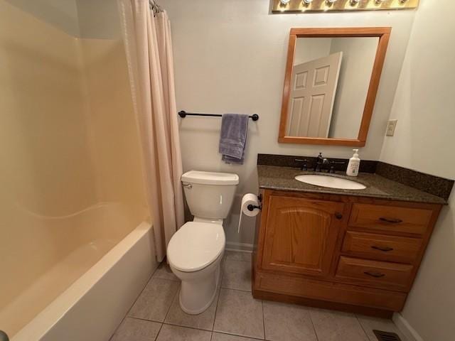 full bathroom featuring vanity, shower / tub combo with curtain, tile patterned floors, and toilet