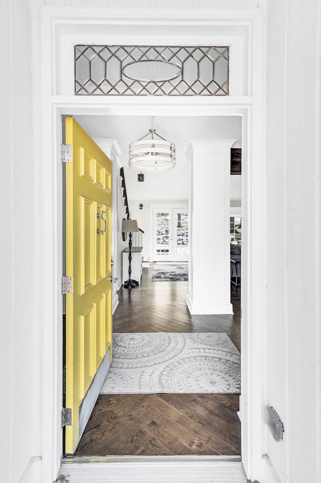 entryway with wood-type flooring