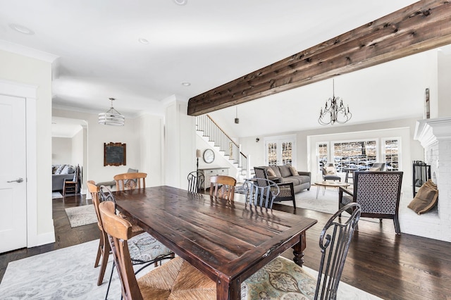 dining room with an inviting chandelier, dark wood-type flooring, and beamed ceiling