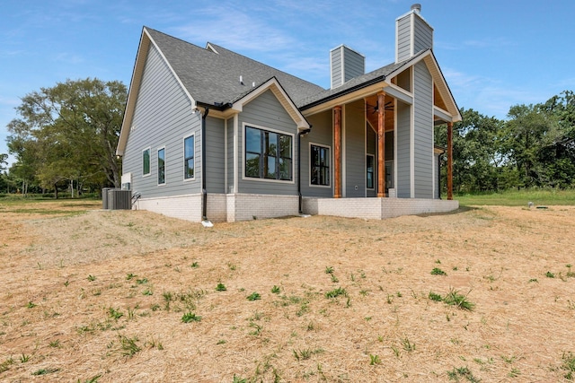 view of front of home featuring cooling unit