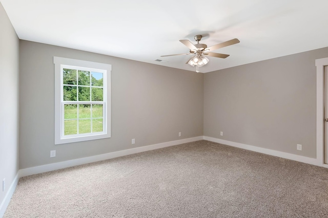 unfurnished room with carpet floors and ceiling fan