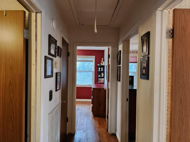 hallway featuring hardwood / wood-style flooring