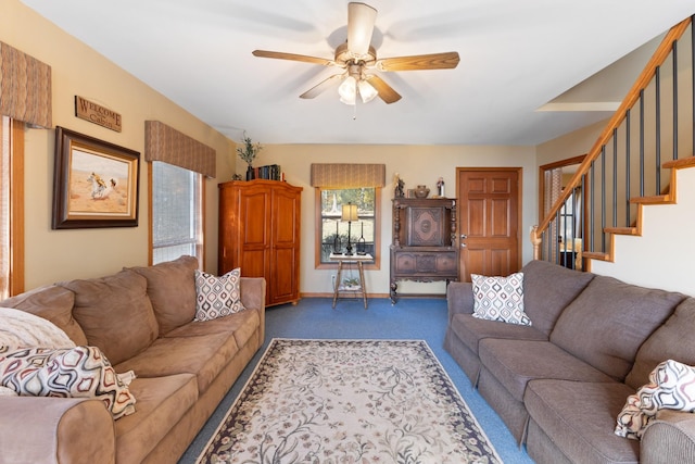 living room featuring carpet flooring and ceiling fan