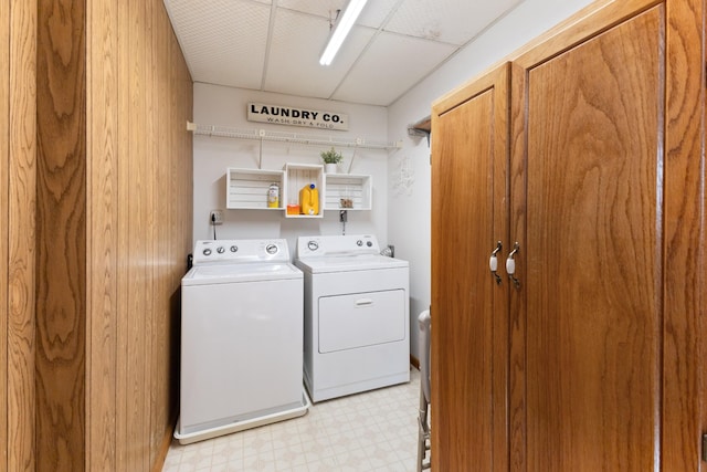 laundry area with independent washer and dryer