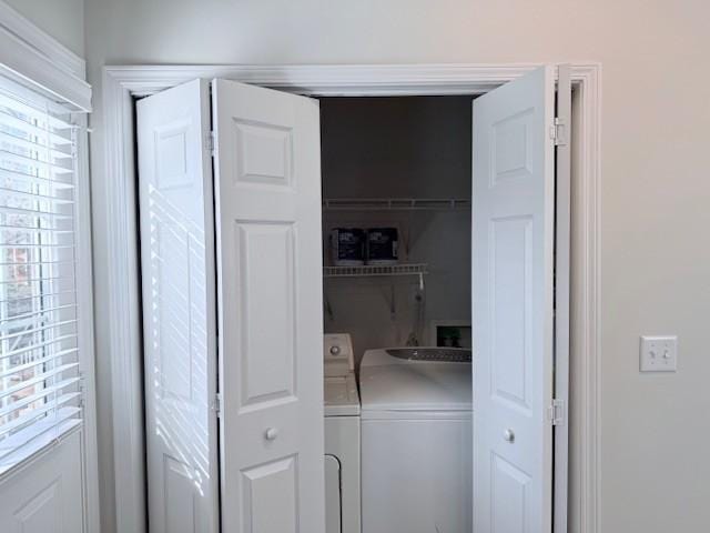 laundry area featuring independent washer and dryer