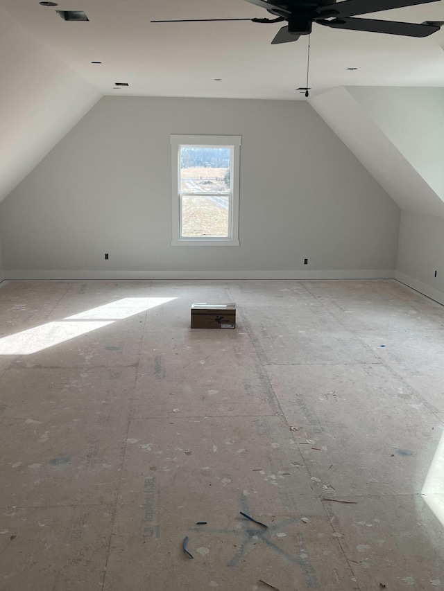 bonus room featuring lofted ceiling and ceiling fan