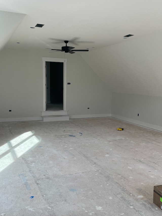 additional living space with lofted ceiling and ceiling fan