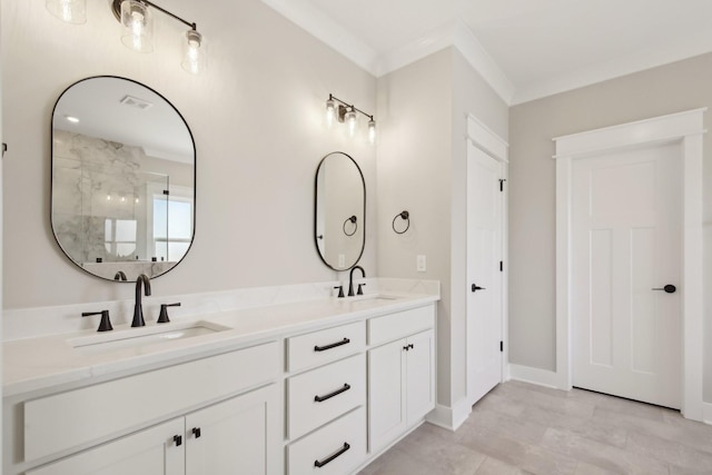 bathroom with vanity, crown molding, and walk in shower