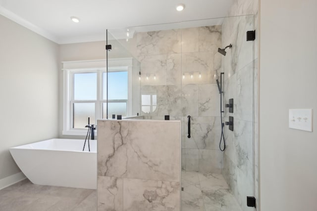 bathroom with separate shower and tub