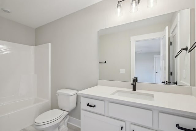 full bathroom featuring shower / tub combination, vanity, and toilet