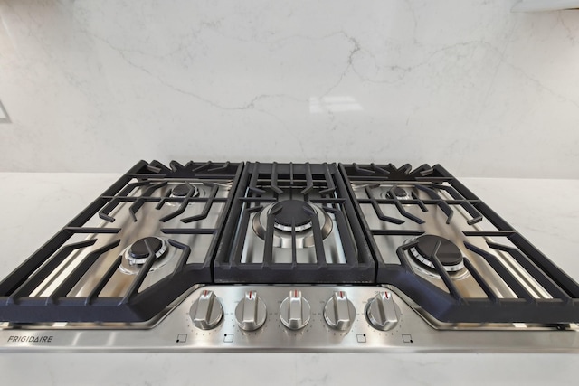 room details featuring stainless steel range oven