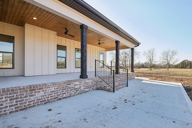 view of patio / terrace with ceiling fan and a porch