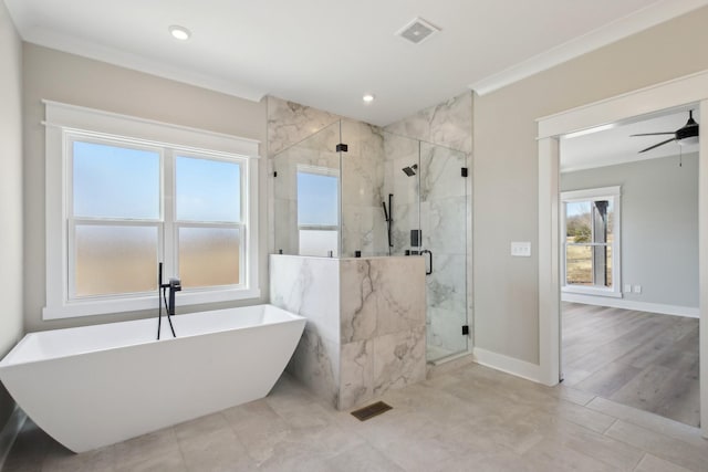 bathroom with crown molding, shower with separate bathtub, and ceiling fan