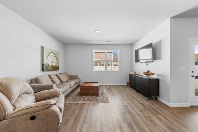 living room featuring hardwood / wood-style floors