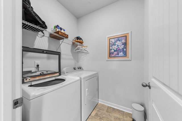 laundry area with independent washer and dryer