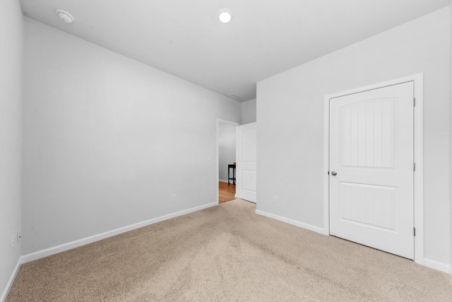 view of carpeted spare room