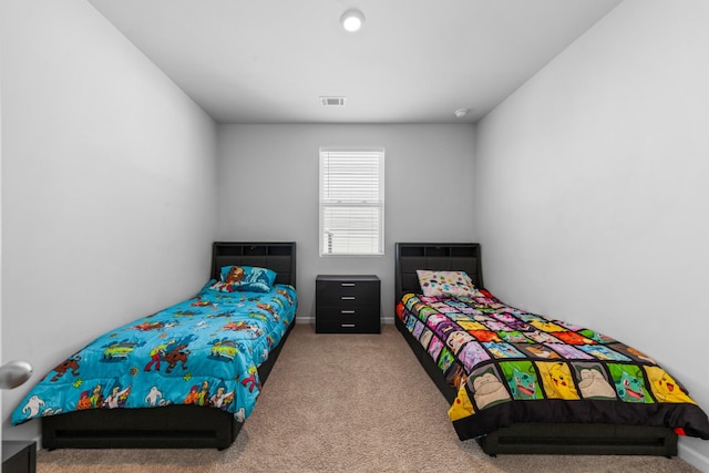 bedroom featuring carpet