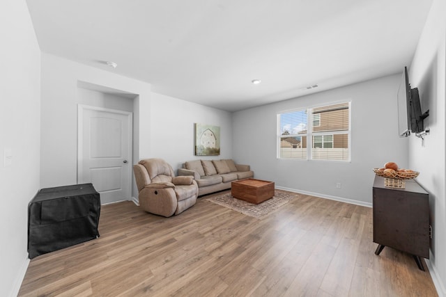 living room featuring light hardwood / wood-style floors