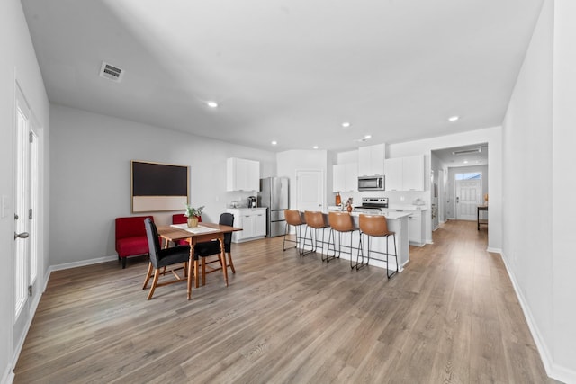 interior space with light hardwood / wood-style flooring