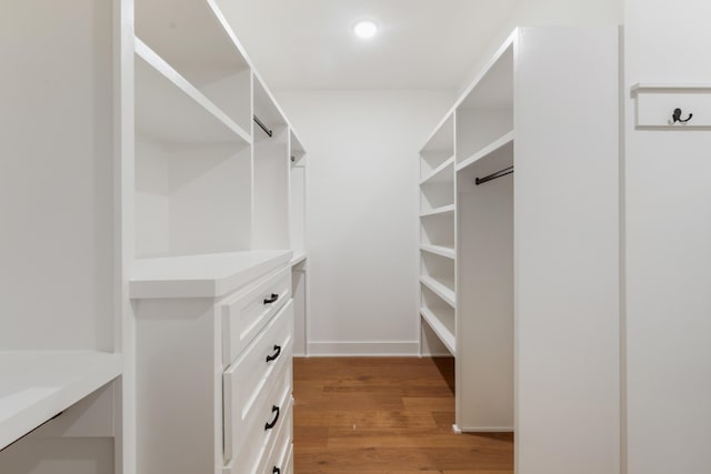 walk in closet featuring light wood-type flooring